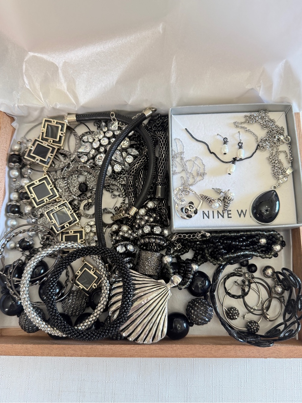 Black and Silver Box of Jewelry